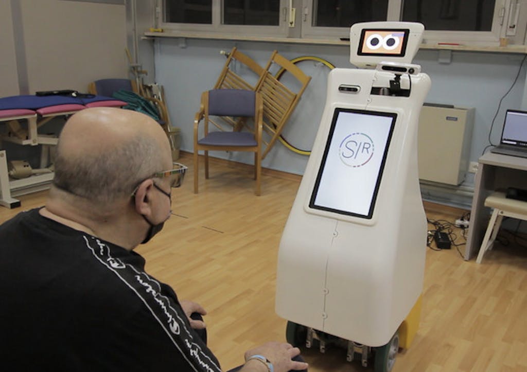 interazione robot paziente parkinson SI robotics
